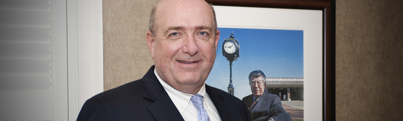 Wright Cox with Herman Wright Cox photo in BankTennessee boardroom