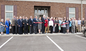 People cutting ribbon at BankTennessee Grand Opening in Munford Tennessee