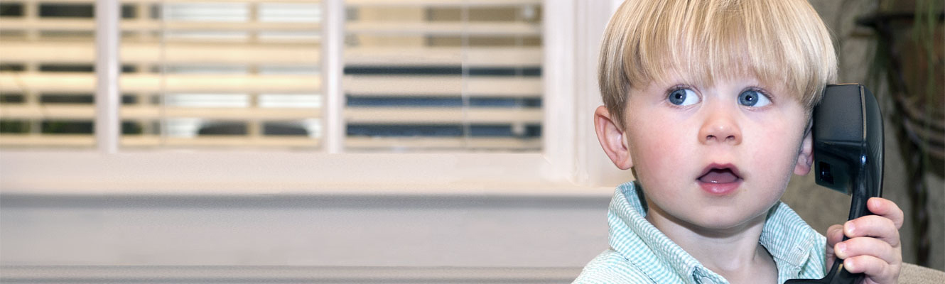 Little boy on office phone